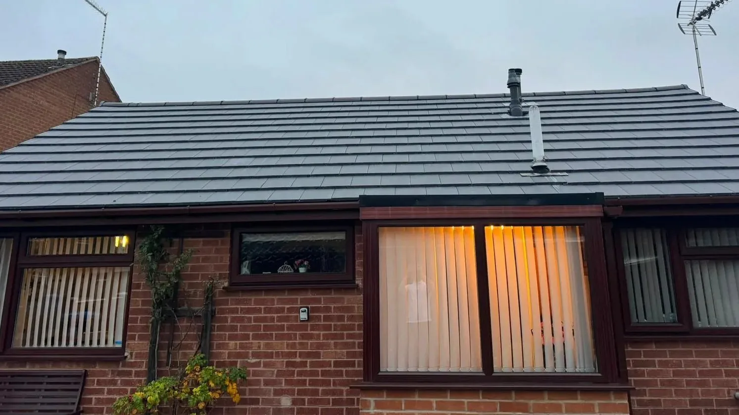 Slate-effect re-roof with new rooflines in Macclesfield